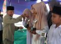 Pj. Bupati T Mirzuan Hadiri Penutupan Pesantren Kilat Di Kampung Jalan Tengah Ketol