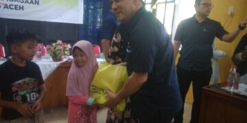 Direktur Irwan Perangin – Angin, Menyantuni Anak Yatim, Dan Anak Berpertasi.