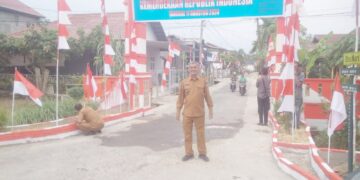 Geuchik Pondok Pabrik Azman MA, SH.MH Memperingati Hari ULang Tahun Repbulik Indonesia Ke -79