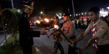 Kapolres Bener Meriah Pimpin Upacara Taptu Dan Pawai Obor Memperingati HUT RI Ke-79