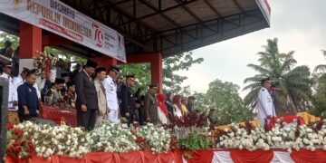 Camat Kampar Kiri Marjanis SE Pimpin Upacara HUT RI Ke-79 