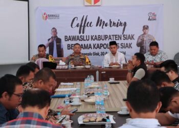 Perkuat Sinergitas Pilkada Aman Dan Lancar, Kapolres Siak AKBP Asep Sujarwadi Ngopi Bareng Bawaslu