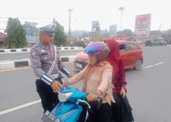 Cooling System Satlantas Polres Kampar Ajak Pengguna Kendaraan Mensukseskan Pilkada 2024