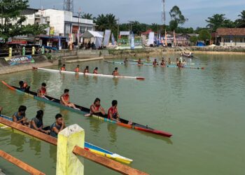 Kapolsek Logas Tanah Darat Pimpin Pengamanan Festival Pacu Jalur Mini 2024
