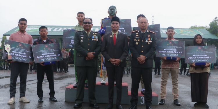 Peringatan HUT TNI Ke-79 di Kodim 0104/Atim: Upacara Khidmat, Kolaborasi Forkopimda, dan Bhakti Sosial Menguatkan Tali Persaudaraan