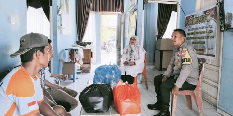 Bhabinkamtibmas Polsek Tambang Gelar Cooling System Di Desa Tanjung Bungo