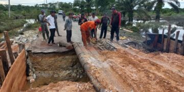 Jalan Putus Akibat Banjir, Kembali Normal Berkat Kerja Keras BPBD Dan Gotong Royong Masyarakat