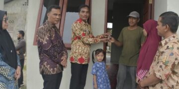 Pj Walikota Langsa Serahkan Bantuan Rumah Sehat
