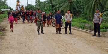 Polsek Makarti Jaya Amankan Upacara Ngaben Di Desa Pangestu 