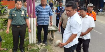 Peletakan Batu Pertama Pembangunan Tugu Selamat Datang Perbatasan Simalingkar B