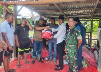 Pj Walikota Langsa Serahkan Bantuan Masa Panik Korban Kebakaran 