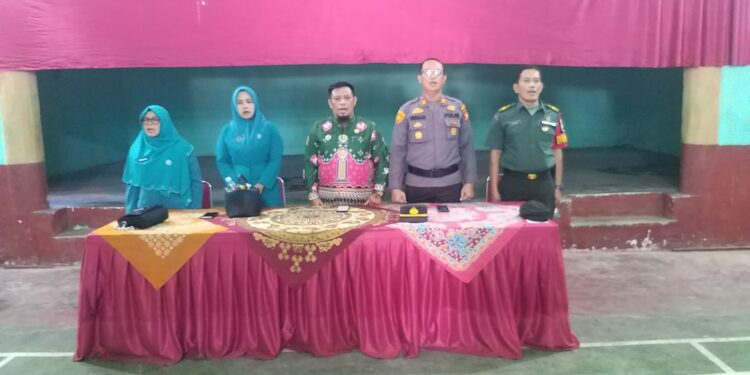 Polsek Pangkalan Kuras Hadiri dan Kawal Langsung Pelantikan Pembina Posyandu se-Kecamatan Pangkalan Kuras