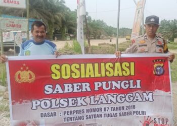 Polsek Langgam Gencar Sosialisasi Saber Pungli, Tegaskan Komitmen Cegah Pungutan Liar di Wilayahnya