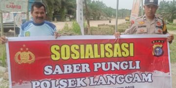 Polsek Langgam Gencar Sosialisasi Saber Pungli, Tegaskan Komitmen Cegah Pungutan Liar di Wilayahnya