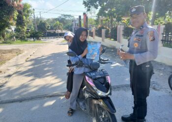 Polsek Pangkalan Kuras Ajak Warga Meriahkan Riau Bhayangkara Run 2025, Bagikan Brosur di Seputaran Kecamatan