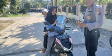 Polsek Pangkalan Kuras Ajak Warga Meriahkan Riau Bhayangkara Run 2025, Bagikan Brosur di Seputaran Kecamatan