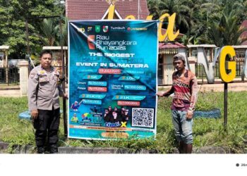 Polsek Bunut Ajak Warga Meriahkan Riau Bhayangkara Run 2025 Lewat Pemasangan Spanduk