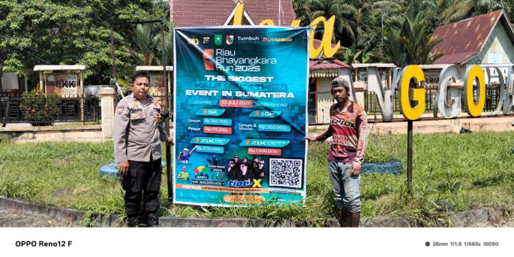 Polsek Bunut Ajak Warga Meriahkan Riau Bhayangkara Run 2025 Lewat Pemasangan Spanduk