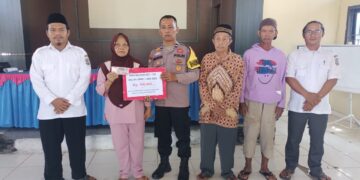 Penyaluran BLT-DD di Desa Pematang Tinggi Berjalan Lancar, Bhabinkamtibmas Aktif Dampingi Warga