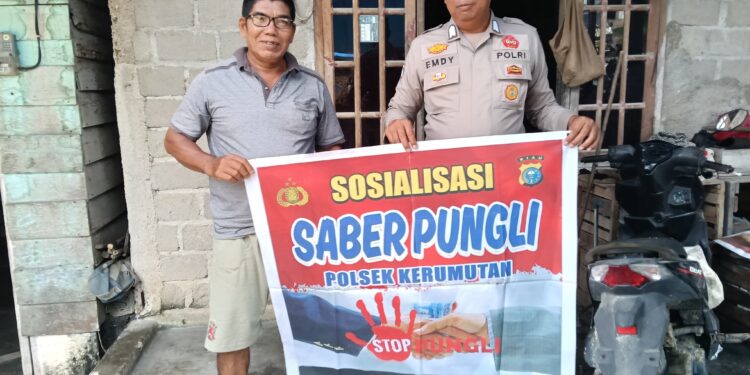 Polsek Kerumutan Sosialisasikan Saber Pungli, Ajak Warga Laporkan Oknum Nakal