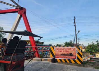 Warga Kota Tanjung Balai Tebarkan Spanduk Menolak Aktivitas Pekerja Migran Indonesia
