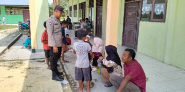 Bhabinkamtibmas Polsek Langgam Laksanakan DDS Sambang Warga, Himbau Jaga Kamtibmas