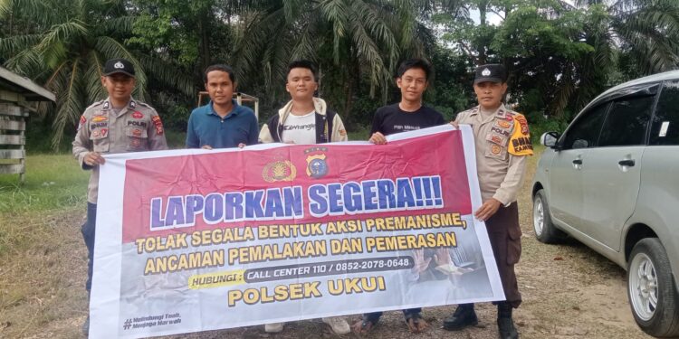 Polsek Ukui Ajak Warga Lawan Premanisme Melalui Media Spanduk