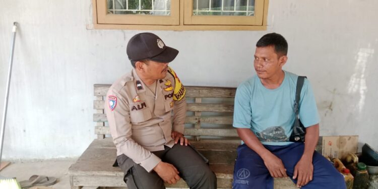 Bhabinkamtibmas di Bunut Pelalawan Ajak Warga Jaga Kamtibmas dan Waspadai Hoaks