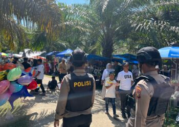 Tim Raga Polres Kuansing Amankan Festival Pacu Jalur Rayon 3 di Kecamatan Pangean