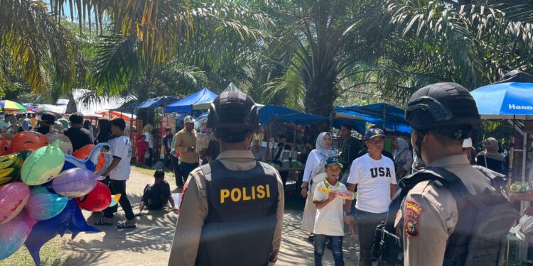 Tim Raga Polres Kuansing Amankan Festival Pacu Jalur Rayon 3 di Kecamatan Pangean