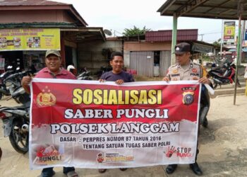 Polsek Langgam Sosialisasikan Saber Pungli, Warga Diminta Hindari Calo