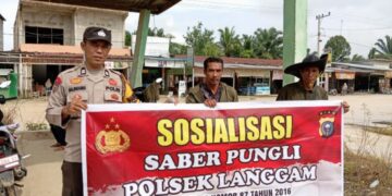 Cegah Praktik Pungli, Polsek Langgam Sosialisasikan Saber Pungli Ke Masyarakat