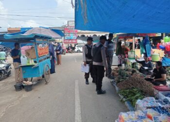 Patroli Pasar Polsek Ukui: Menyapa Warga, Menjaga Aman