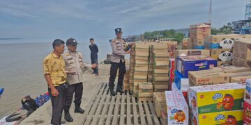 Cegah Masuknya Barang Ilegal, Polsek Kuala Kampar Gelar Patroli di Pelabuhan dan Pertokoan