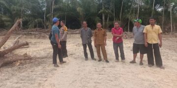 Polsek Pangkalan Kuras Tinjau Lahan Program Ketahanan Pangan di Desa Dundangan