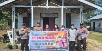 Hijaukan Lingkungan, Polsek Teluk Meranti Tanam Pohon dan Bagikan Masker di Gereja GGP