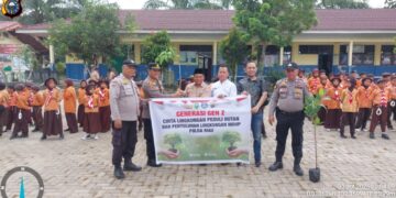 Polsek Pangkalan Lesung Luncurkan Program Green Policing dengan Penanaman Pohon di SDN 009 Desa Sari Mulya