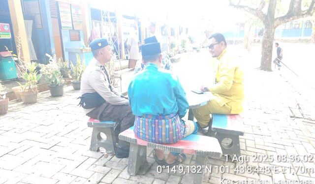 Bhabinkamtibmas Langgam Sambangi Warga, Imbau Waspada Hoaks dan Jaga Kamtibmas