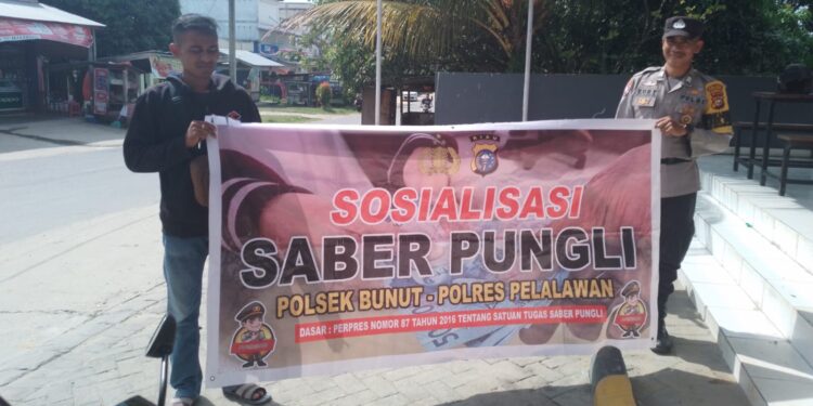 Polisi Sosialisasikan Saber Pungli di Tiga Titik di Kecamatan Bunut Pelalawan