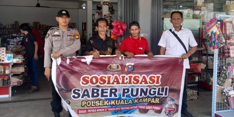 Cegah Pungli, Polsek Kuala Kampar Sosialisasikan Perpres Saber Pungli ke Masyarakat