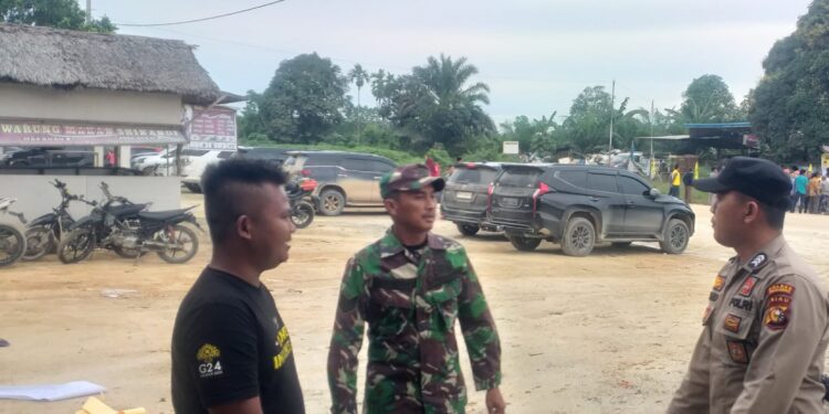 Polsek Langgam Jalin Sinergitas Lewat Silaturahmi Bersama TNI Koramil 09