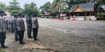 Polsek Pangkalan Lesung Bersama Upika Gelar Upacara HUT ke-26 Kabupaten Pelalawan