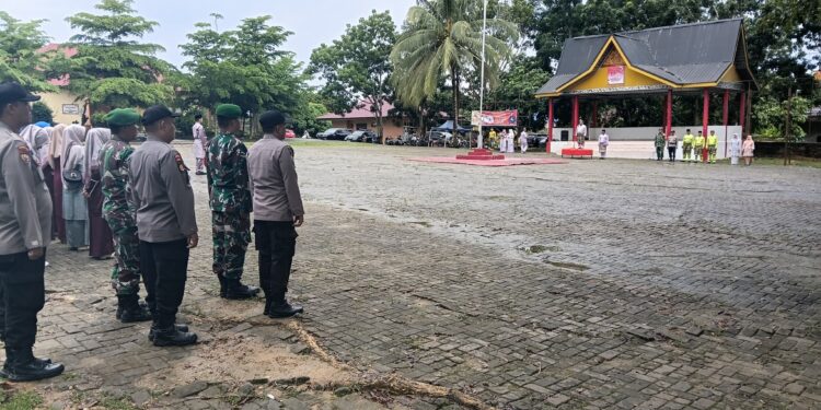Polsek Pangkalan Lesung Bersama Upika Gelar Upacara HUT ke-26 Kabupaten Pelalawan