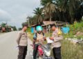 Patroli Polsek Kerumutan Sosialisasikan Larangan Bakar Lahan di Daerah Rawan Karhutla