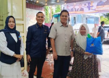 Rangkaian HUT ke-14, Irsan Sosiawan Hadir ke DPD NasDem Langsa Bagi Sembako Gratis dan Donor Darah