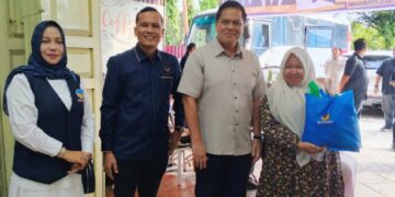 Rangkaian HUT ke-14, Irsan Sosiawan Hadir ke DPD NasDem Langsa Bagi Sembako Gratis dan Donor Darah