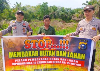 Polsek Teluk Meranti Ajak Warga Peduli Lingkungan Lewat Sosialisasi Larangan Membakar Lahan