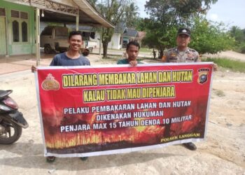 Polisi Langgam Sosialisasikan Larangan Membakar Hutan dan Lahan