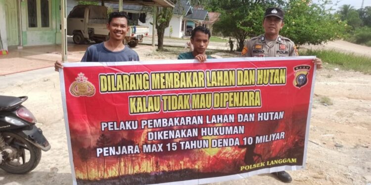 Polisi Langgam Sosialisasikan Larangan Membakar Hutan dan Lahan