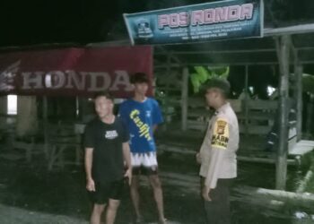 Polsek Langgam Cek Pos Kamling untuk Perkuat Harkamtibmas di Desa Segati